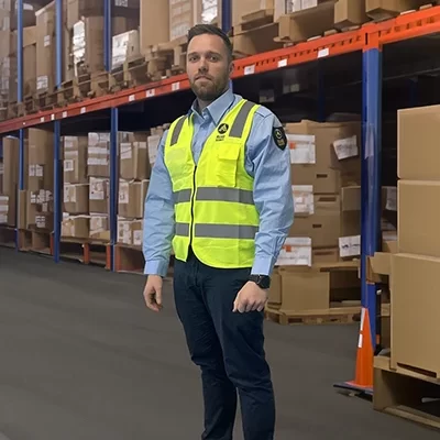 allied security gaurding a warehouse in Australia